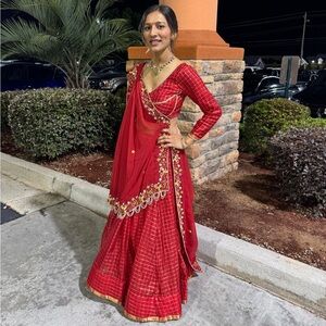 Elegant Red Lehenga with Gold Embellishments